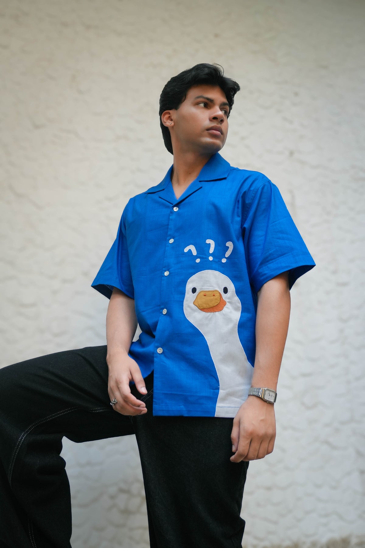 Close-up of the appliquéd duck motif, Royal blue cotton men's shirt