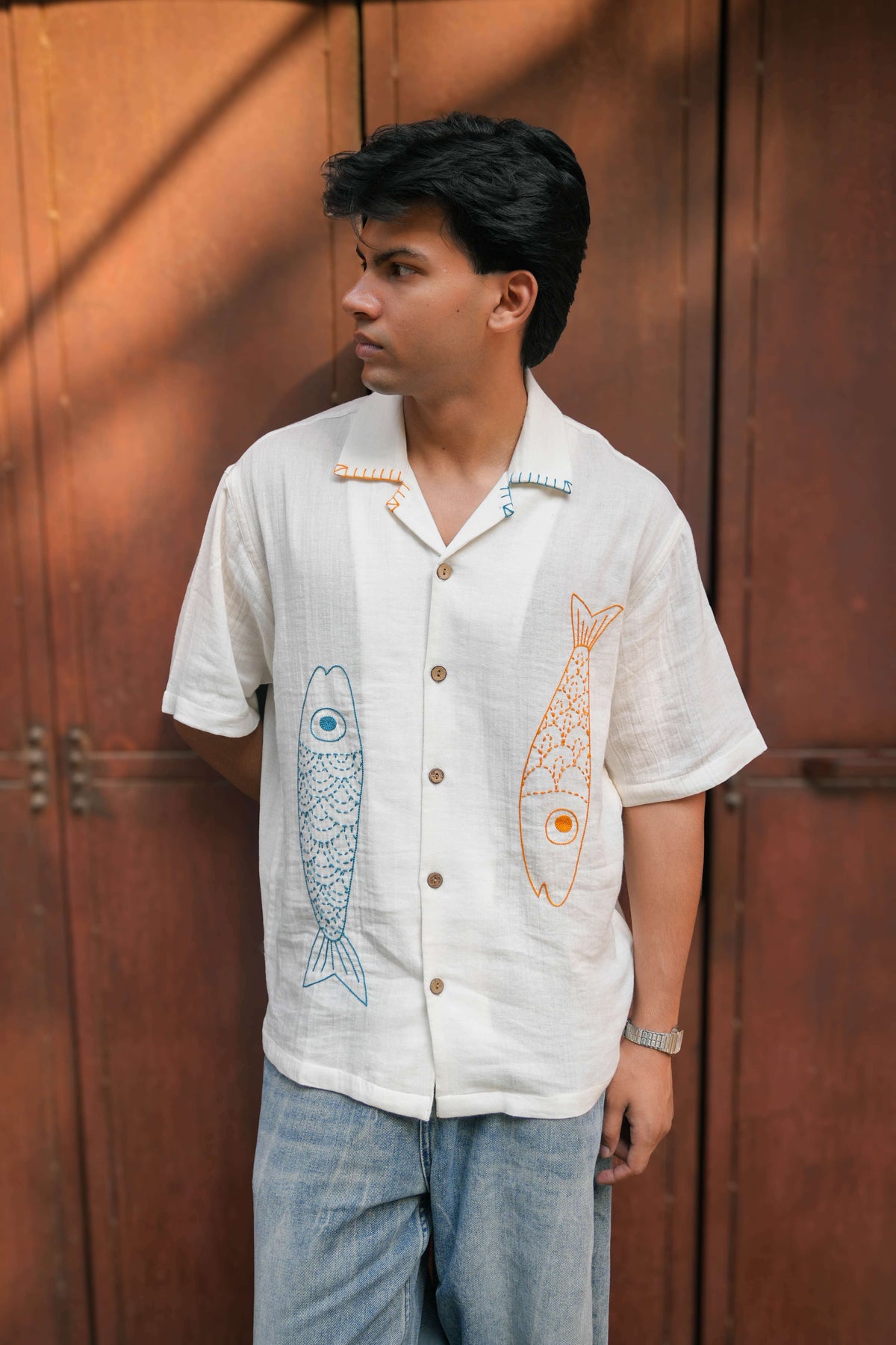 Off white double cloth cotton shirt for men with hand embroidered fish motifs, front view