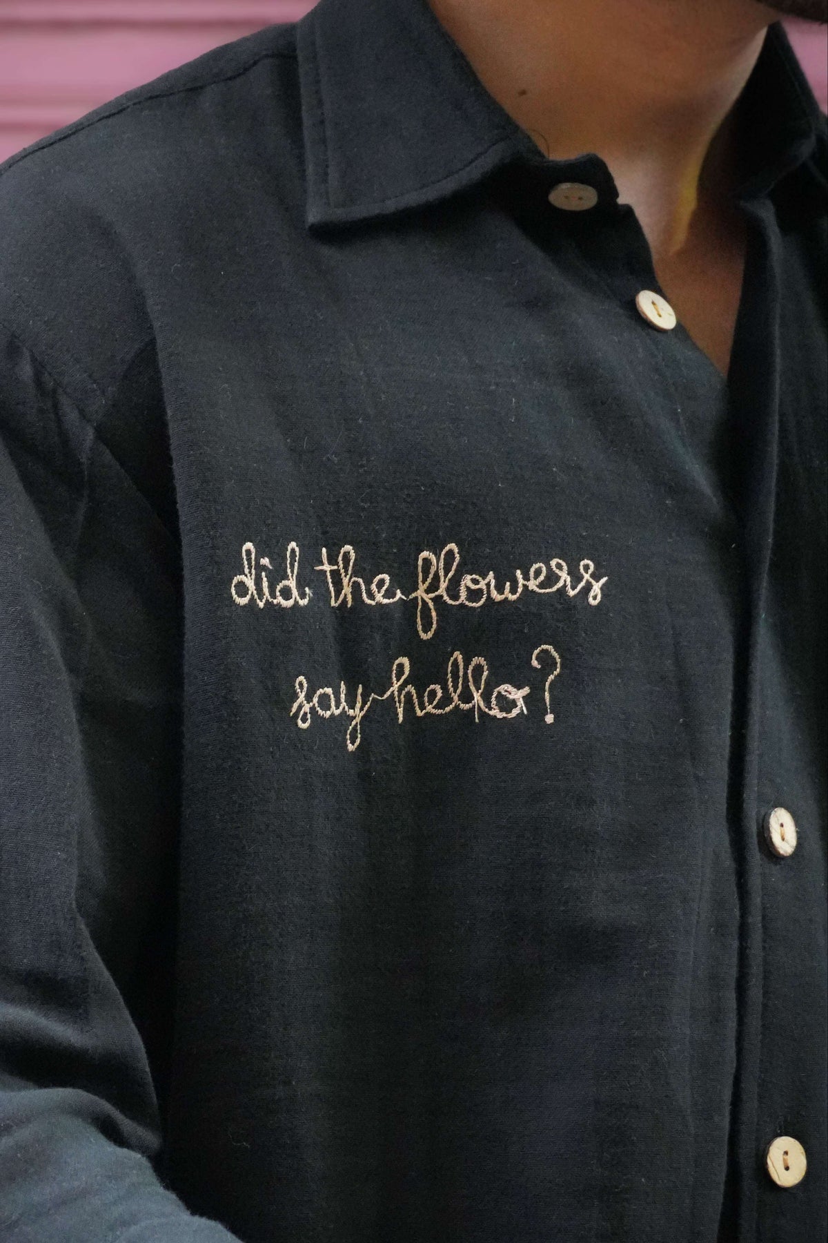 Close-up of the hand embroidered text on the chest, Black double cloth cotton men's shirt