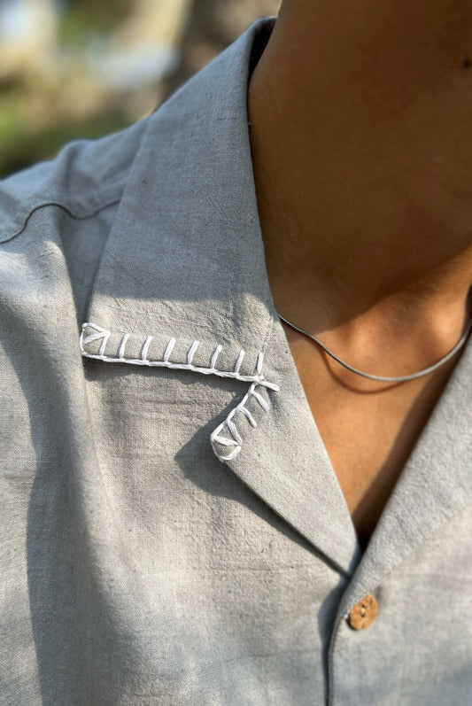 Close-up of the blanket stitch collar detail, Pearl grey handloom cotton men's shirt