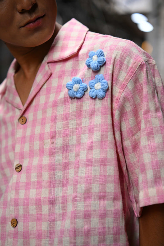 Close-up of the blue crochet flowers on the shoulder, Pink checks cotton men's shirt
