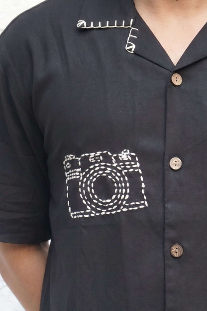 Hand embroidered camera motif and coconut shell buttons, black modal shirt