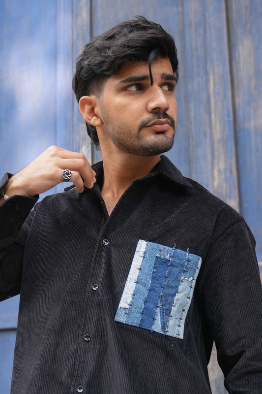 Close-up of the denim patchwork pocket, Black corduroy men's shirt