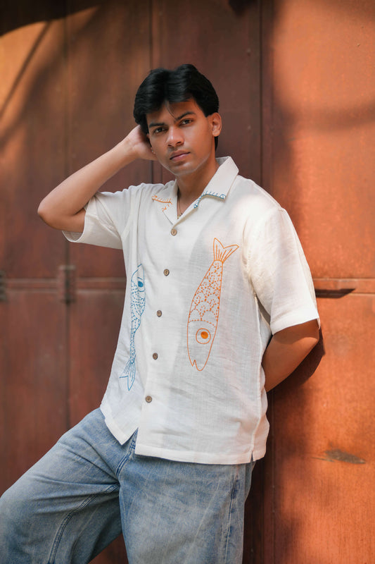 Off white double cloth cotton shirt for men with hand embroidered fish motifs, relaxed front view
