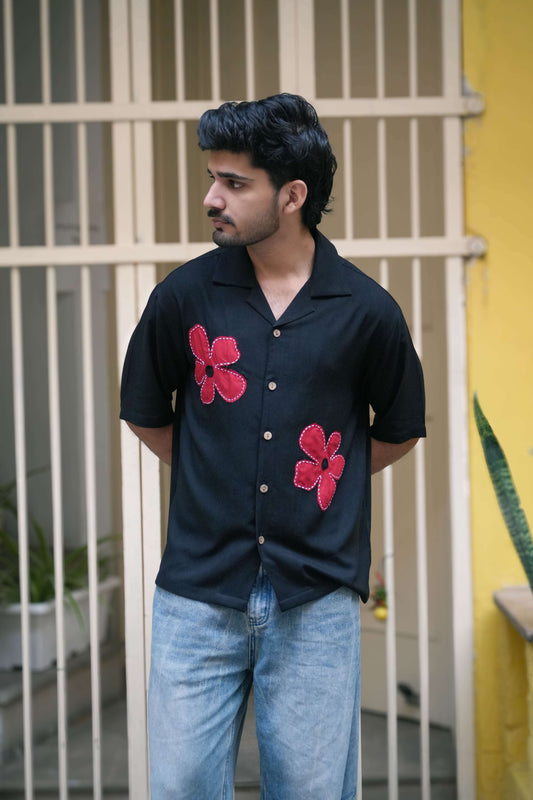 Black modal viscose shirt for men with hand appliquéd red floral motifs, front view