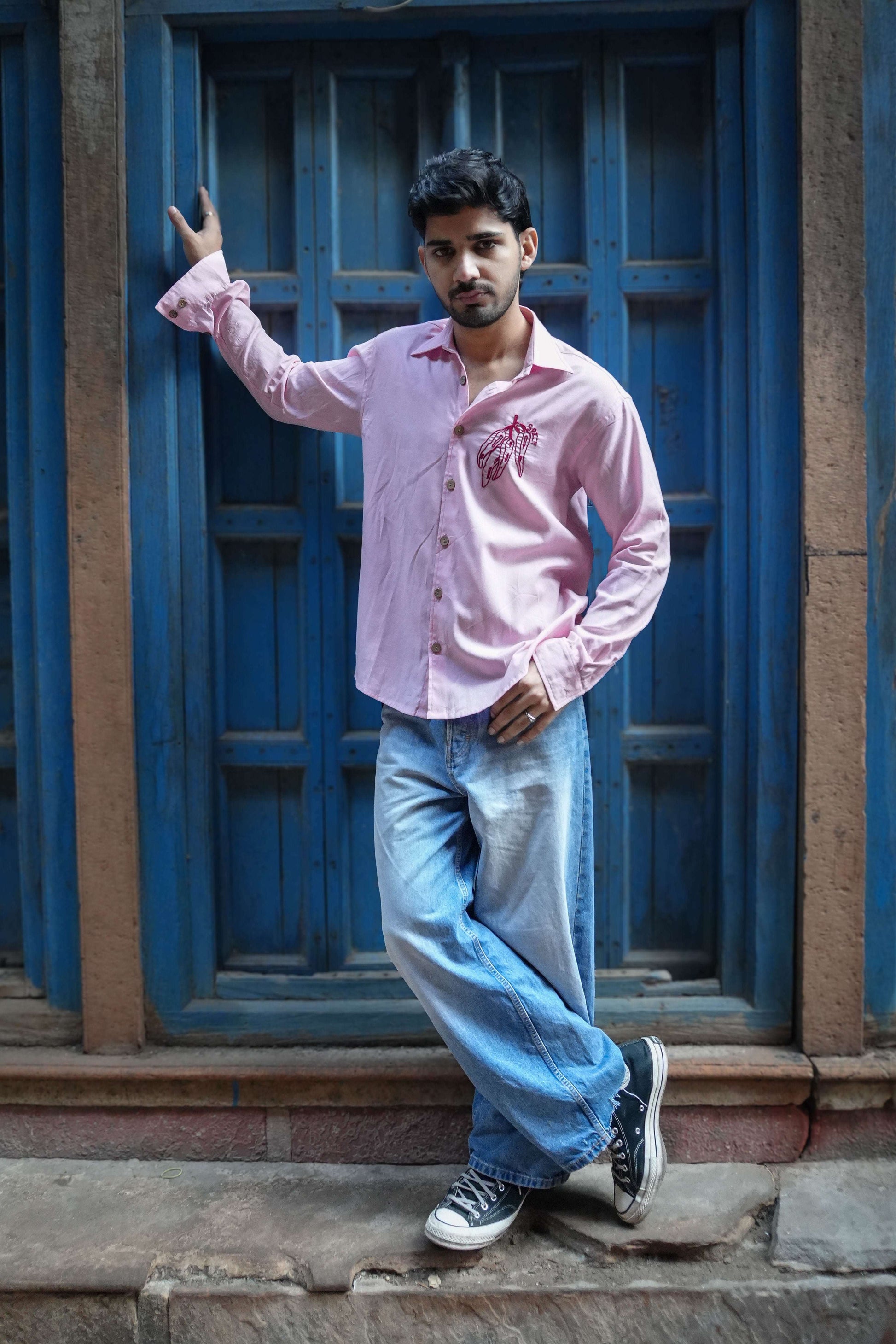 Blush pink cotton satin shirt for men with hand embroidered chilli motif, full-length view