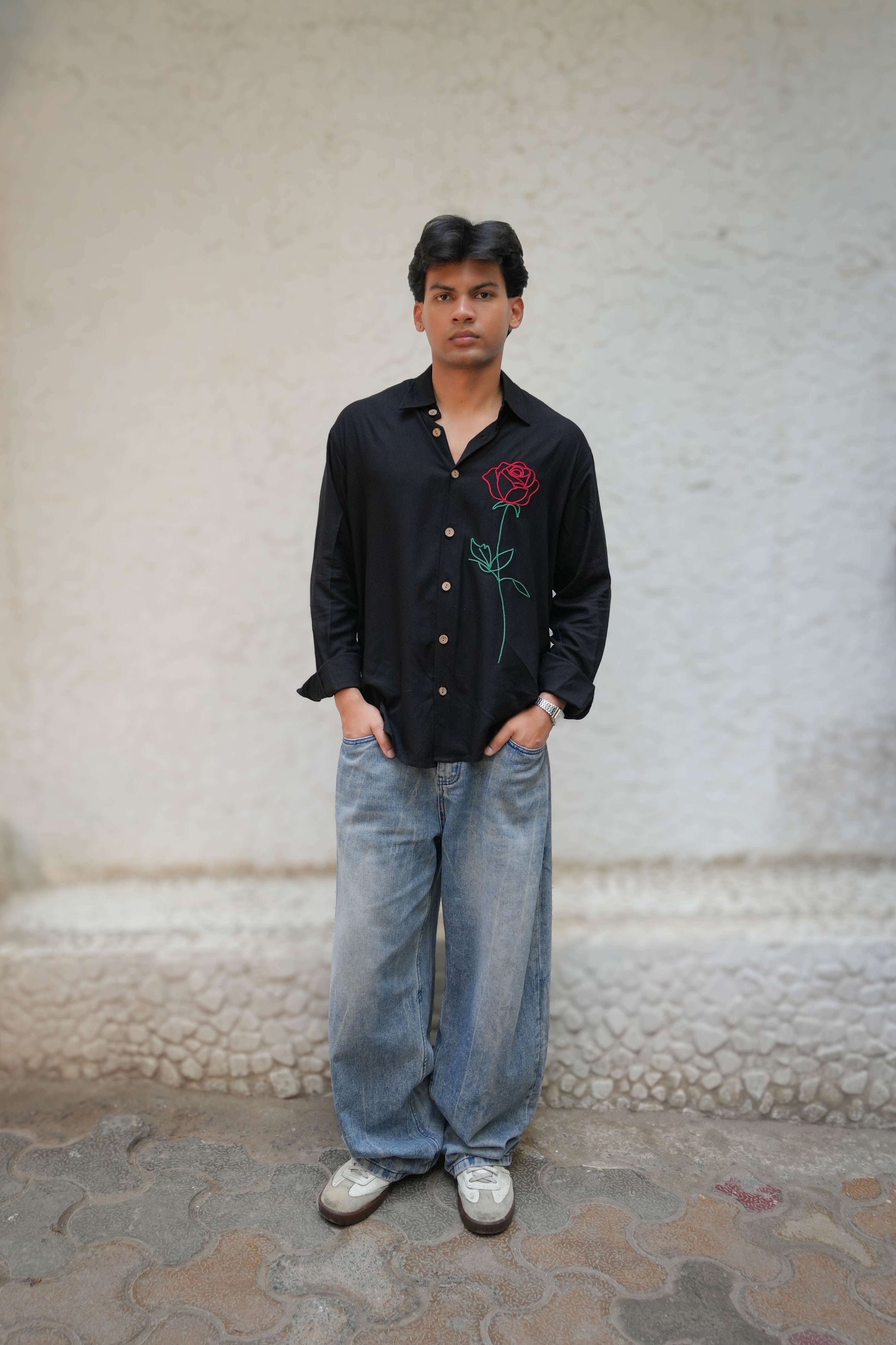 Black modal viscose shirt for men with embroidered red rose motif, full-length view