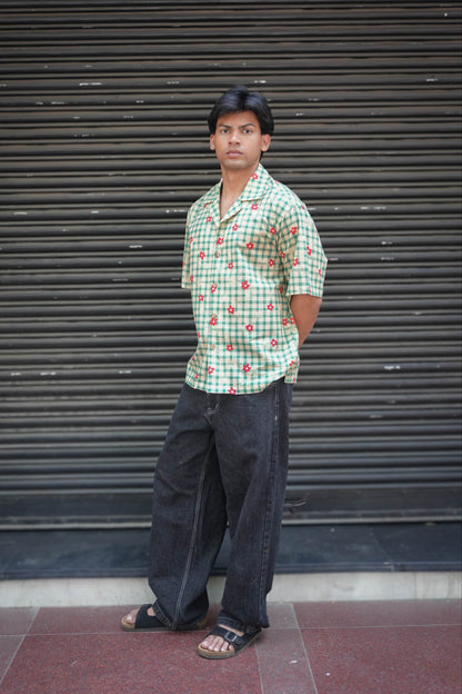 Green checks cotton shirt for men with printed floral motifs, three-quarter view