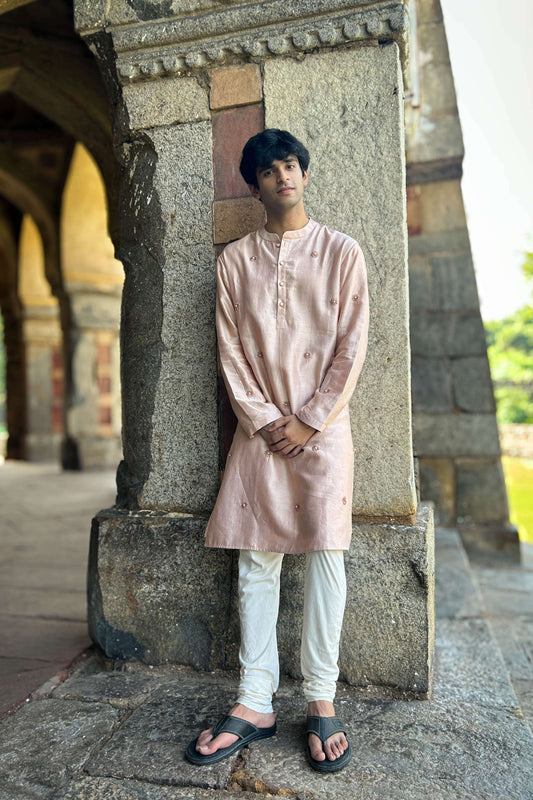 Blush pink Chanderi silk kurta for men with hand embroidered daisy motifs, full-length view