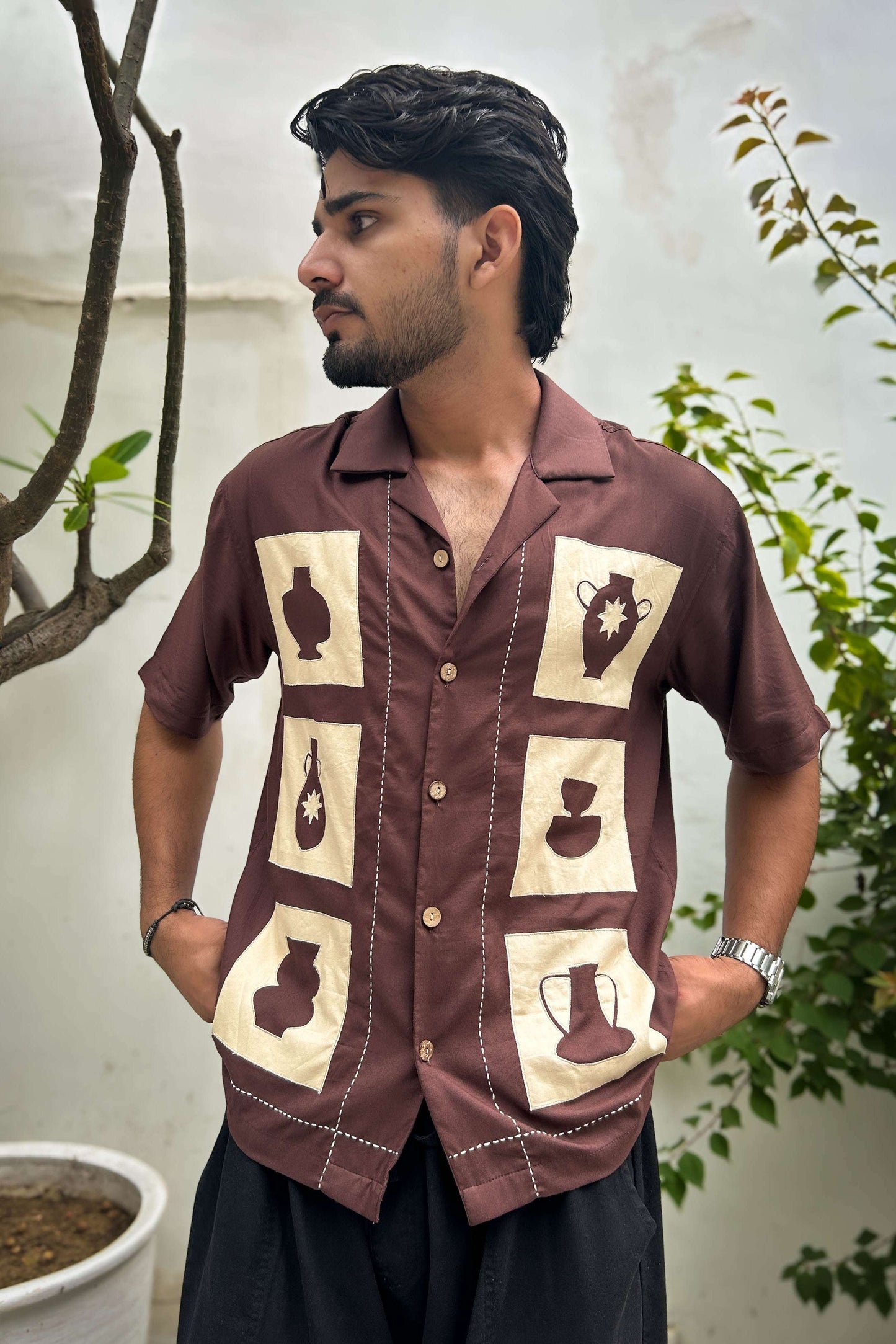 Brown modal shirt for men with pottery appliqué motifs, front view