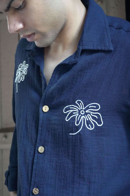 Close-up of the white aari floral embroidery, Navy blue double cloth cotton men's shirt