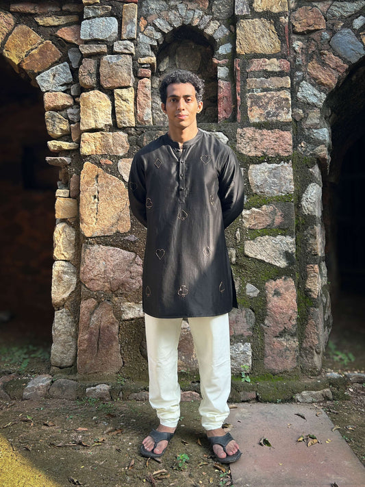 Black Chanderi silk kurta for men with hand embroidered playing card motifs, full-length view