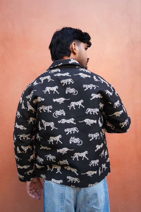 Back view of Black jacquard men's jacket showing the relaxed drape