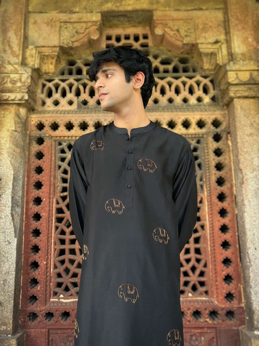 Black Chanderi silk kurta for men with hand embroidered elephant motifs, three-quarter view
