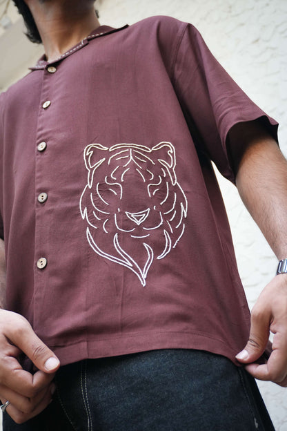 Close-up of the tiger motif embroidery on the hem, Brown modal viscose men's shirt