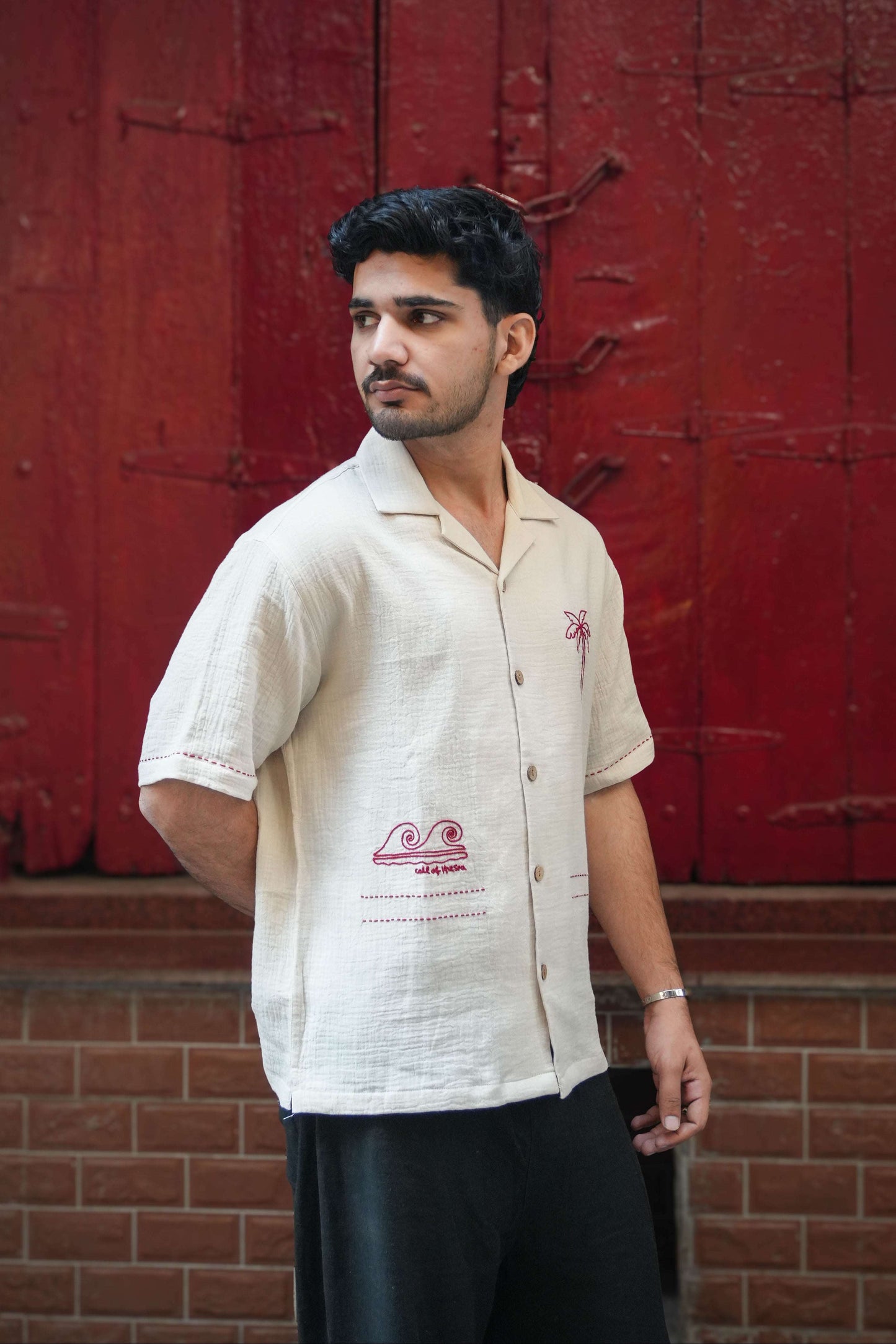 Beige double cloth cotton shirt for men with aari embroidered palm tree and waves, front view