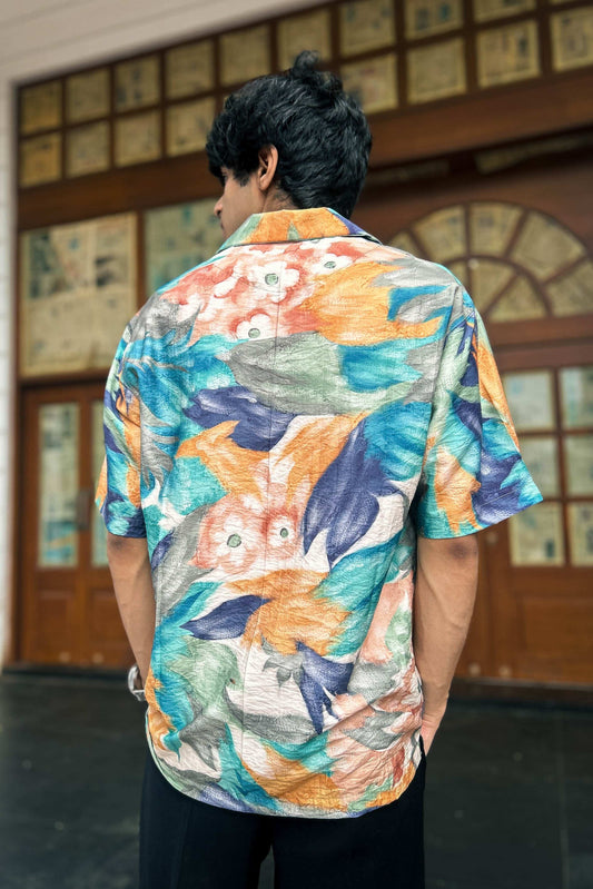 Back view of Multicolour printed viscose men's shirt showing the relaxed drape