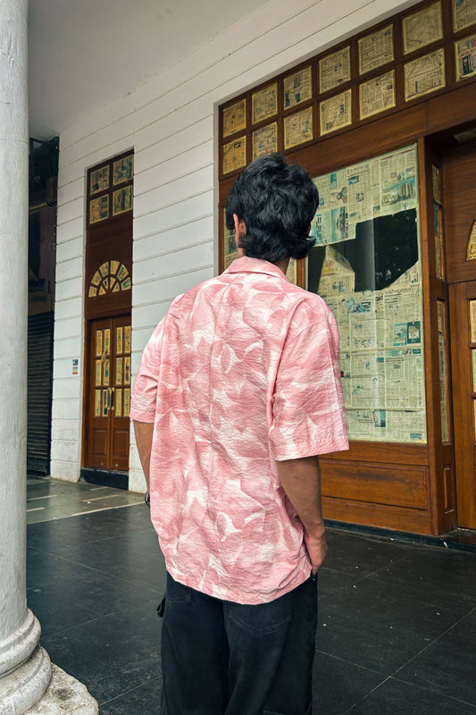 Back view of Blush pink viscose men's shirt showing the relaxed drape