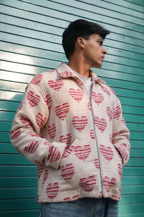 Pink and red cotton jacquard jacket for men with woven heart motifs, three-quarter view