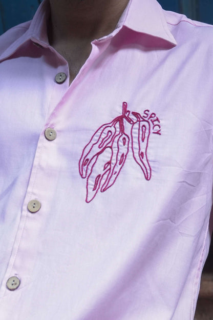 Close-up of the chilli motif with embroidered text, Blush pink cotton satin men's shirt
