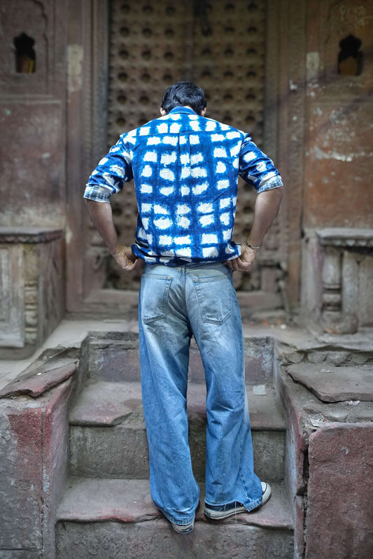 Back view of Indigo blue printed cotton viscose men's shirt showing the relaxed drape