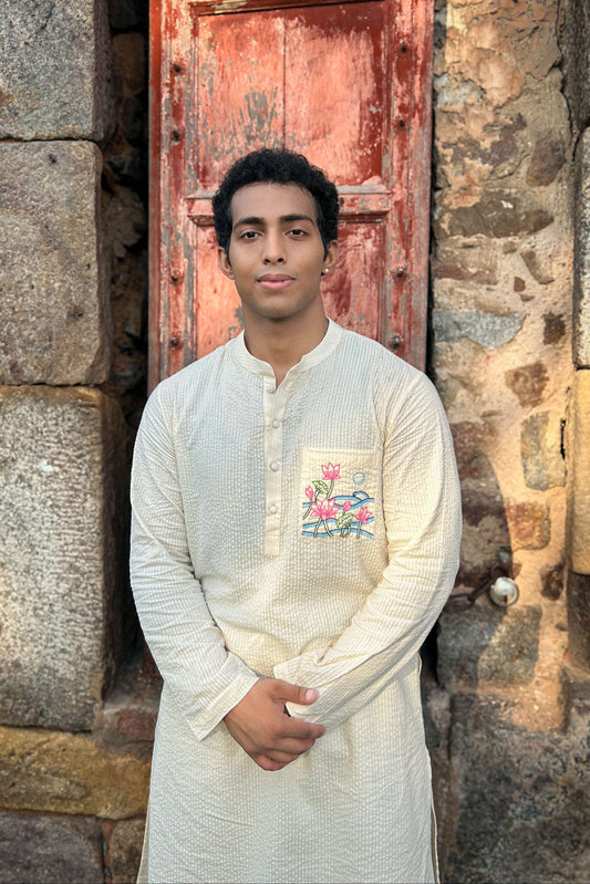 Ivory cotton kurta for men with hand embroidered lotus pond pocket, front view