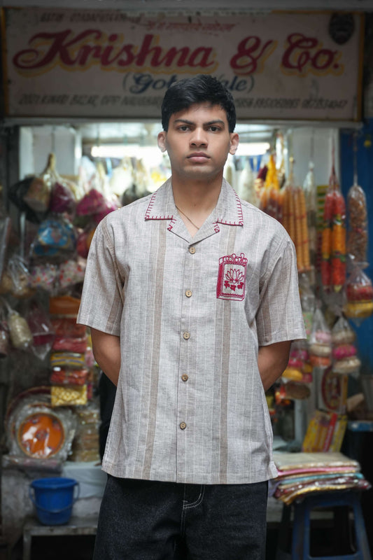 Sand beige cotton shirt for men with hand embroidered matchbox motif, front view