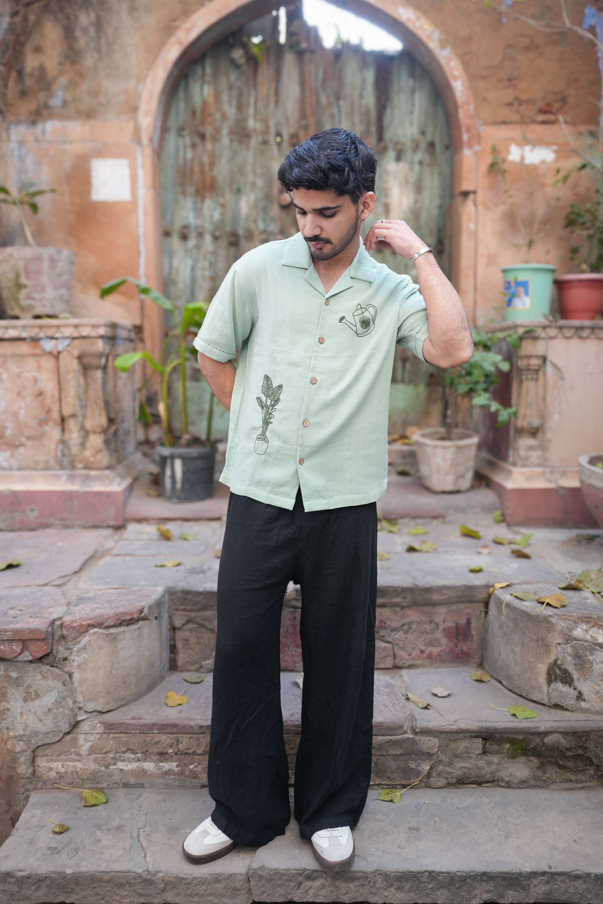 Sage green double cloth cotton shirt for men with aari hand embroidered garden motifs, full-length view