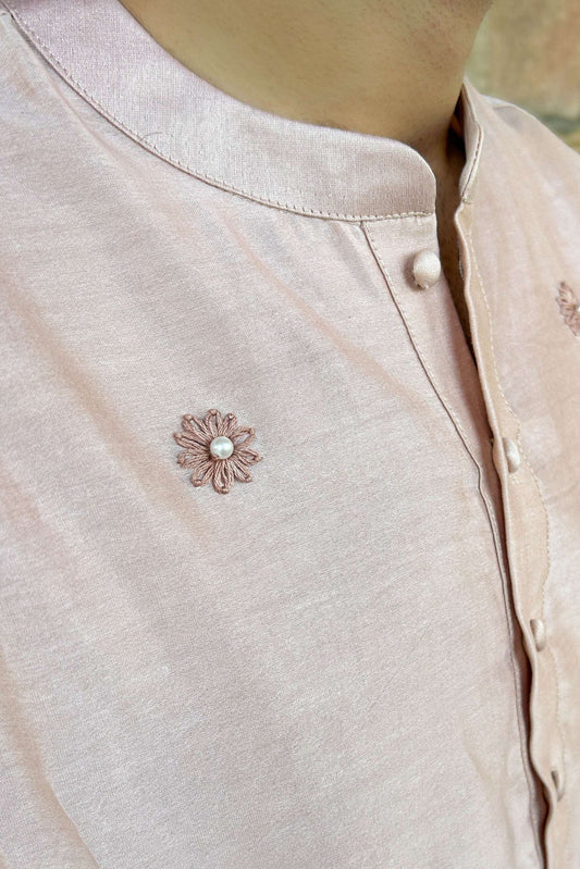 Close-up of the daisy motif and pearl buttons, Blush pink Chanderi silk men's kurta