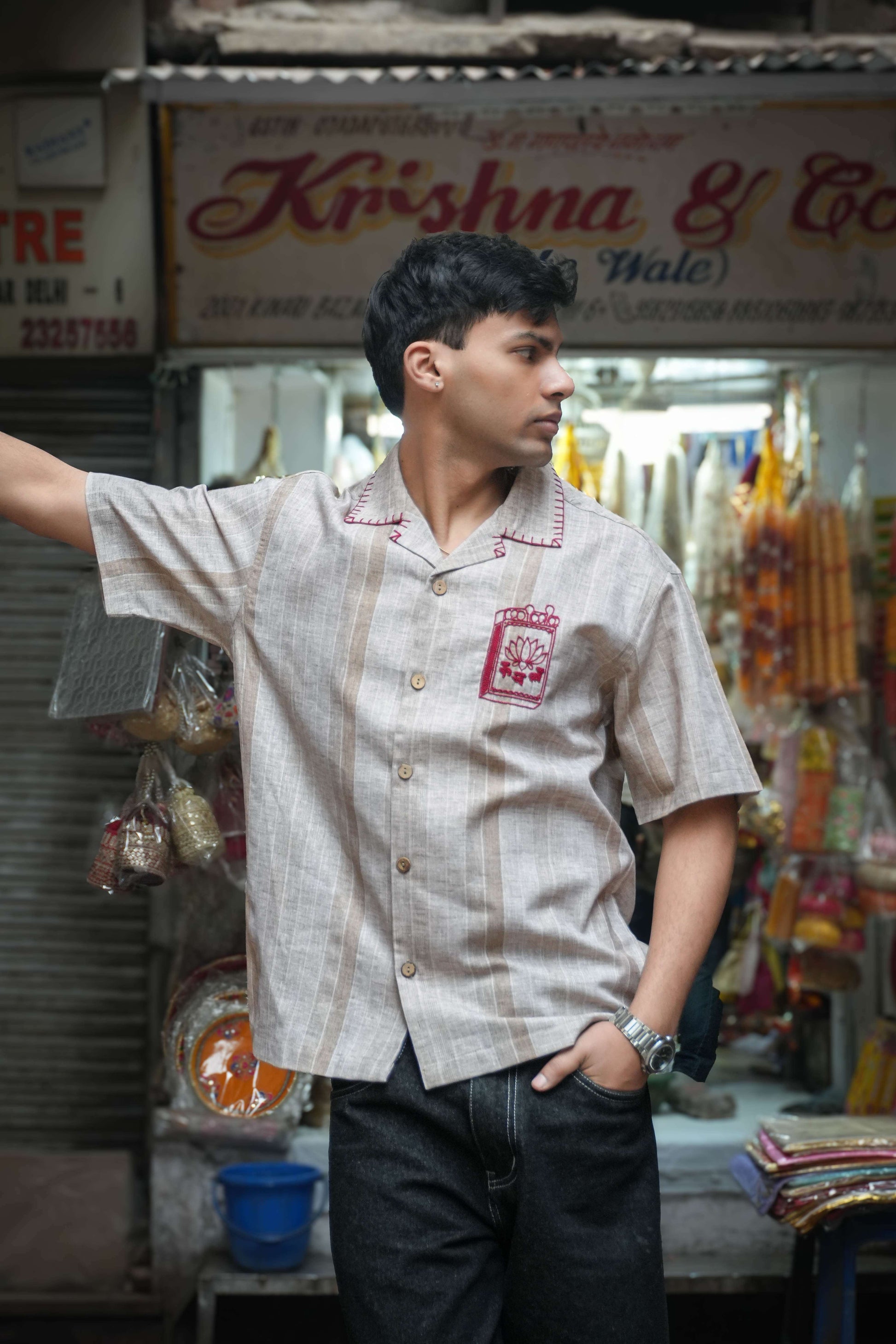 Sand beige cotton shirt for men with hand embroidered matchbox motif, three-quarter view, Sivakasi Embroidered Shirt by Oje'