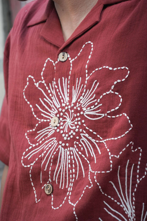 Close-up of the floral embroidery in aari, kantha and French knots, Red double cloth cotton men's shirt