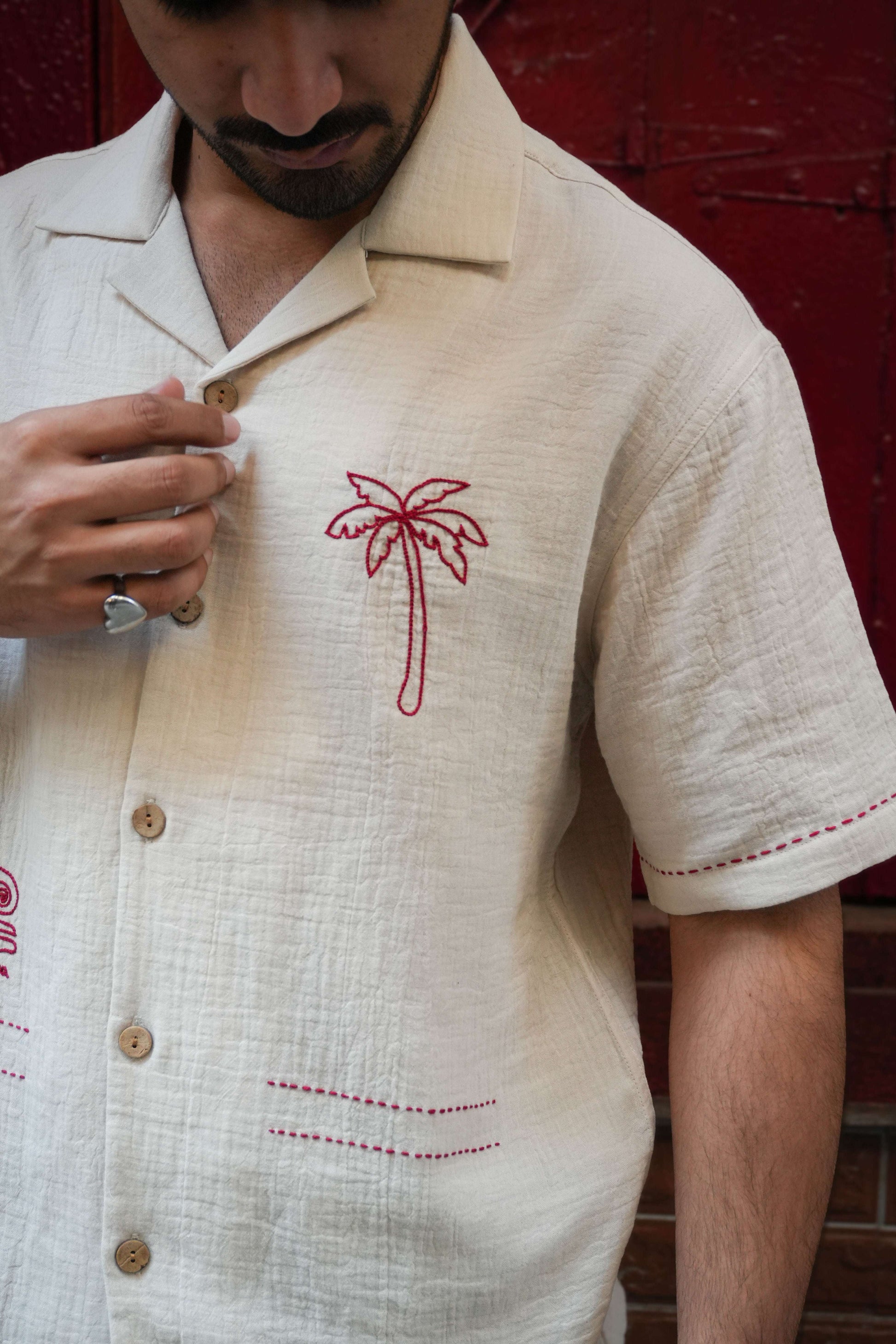 Close-up of the palm tree embroidery with kantha detailing, Beige double cloth cotton men's shirt
