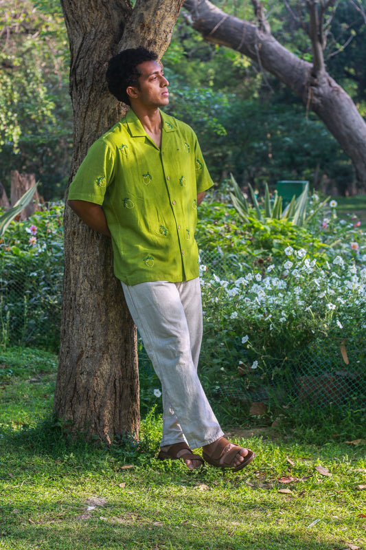Apple green linen shirt for men with kantha lemon motifs, full-length view