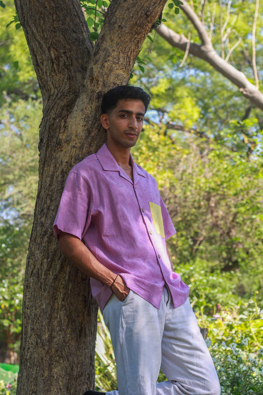Lavender textured cotton shirt for men with contrast lemon yellow pocket, three-quarter view