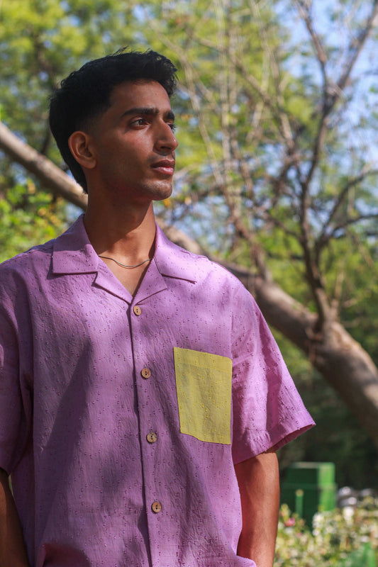 Lavender textured cotton shirt for men with contrast lemon yellow pocket, three-quarter view