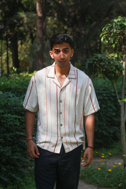 Beige striped linen shirt for men with hand embroidered collar and placket, front view
