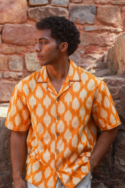 Marigold yellow ikat handloom cotton shirt for men with hand embroidered collar detail, front view