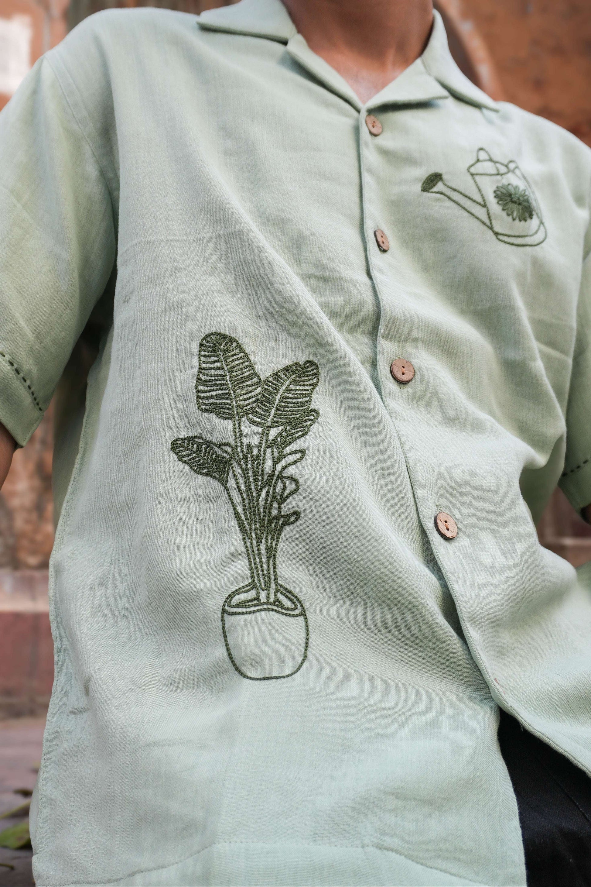 Close-up of the potted plant embroidery, Sage green double cloth cotton men's shirt