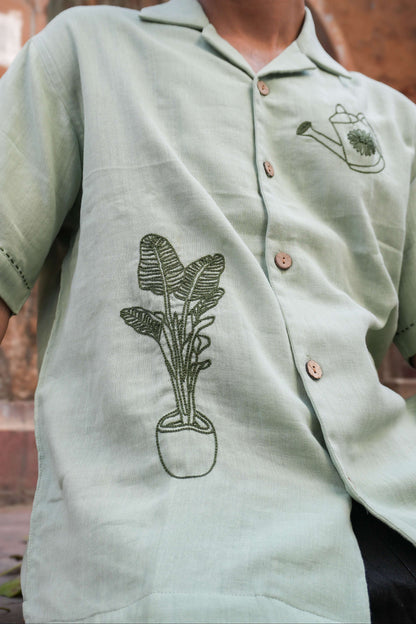 Close-up of the potted plant embroidery, Sage green double cloth cotton men's shirt