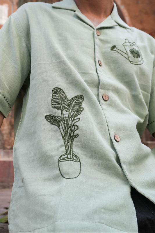 Close-up of the potted plant embroidery, Sage green double cloth cotton men's shirt
