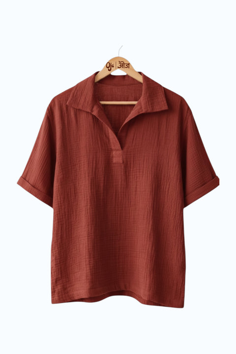 Rust red double cloth cotton popover shirt for men on a hanger